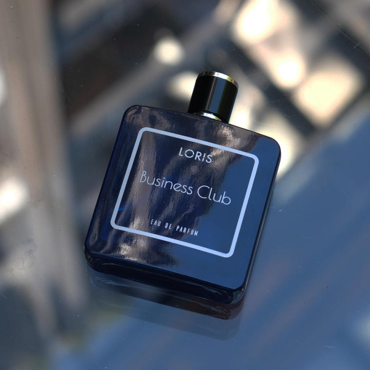 Business Club fragrance flat lay product shot